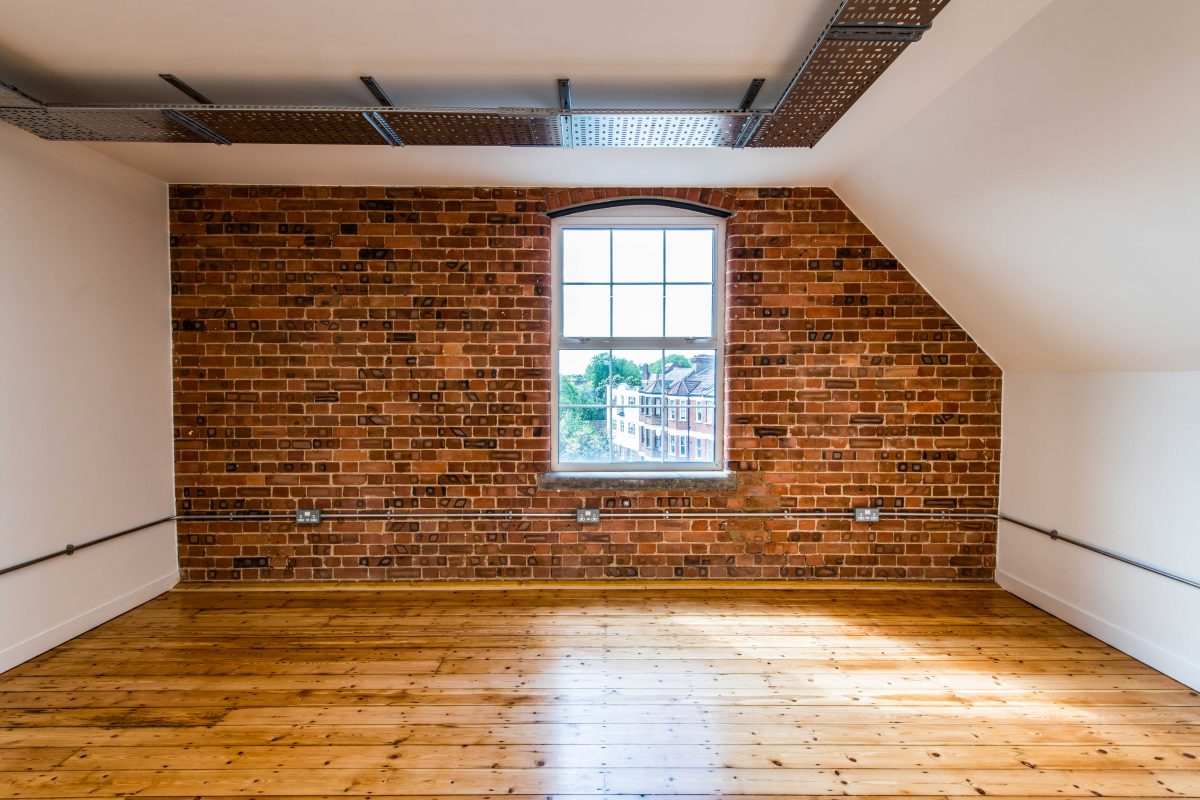 rustic interior style, bricks and wooden flooring