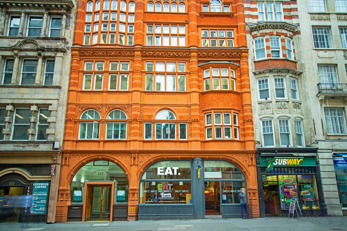 tangerine building with Eat dining